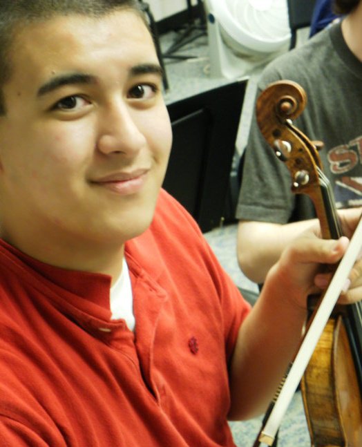 Student violinist excels, looks toward music school