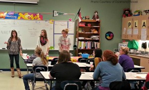 ECE members listen intently as Hannah Mathis, president, Shannon Kearney, vice president, and Sterling Shelly, treasurer, talk about future plans for the club. Community service hours that are received in ECE can be used as service hours for NHS.