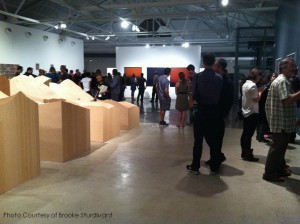 Maya Lin’s ‘Blue Lake Pass’ (Left) is viewed in CAM’s main art gallery while opera singers and an open bar entertain guests. The museum also features exhibits by David Maisel.