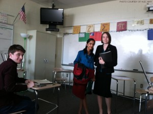 Debaters Myra Patwardhan (center) and Cary Schellenberger (right) shake hands after a debate judged by Jack Leff (left). The resolution was Resolved:  In the United States criminal justice system, truth-seeking ought to take precedence over attorney-client privilege.