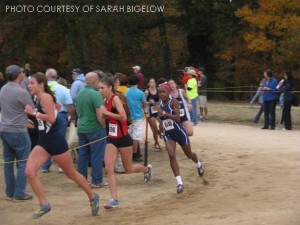 G’yasimine Butler, sophomore, strenuously makes her last turn for the final stretch of her 5 kilometer race. The girls team placed eighth among a competitive field of teams.