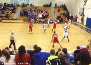 The Leesville defense seeks to fend off a dangerous Sanderson offense during the fourth quarter of Friday's game. Despite fervent support from the packed home grandstand, Leesville faded as fatigue set in and fell 79-75.