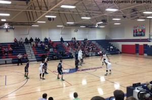 Jonathan Mebane contests for the opening tip-off Monday night at Jordan. His efforts proved crucial in the final minute as Leesville squeaked out a 57-54 win.