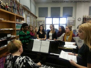 The students warm-up for vocal rehearsals. Opening night will be on April 10.