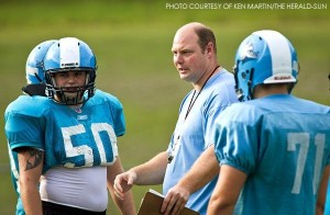 Hobgood coaching players at a South Granville practice in recent years.