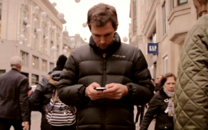 We look down at our phones most frequently in public places where we are amongst strangers. It’s almost of the norm now to go for a stroll in a city and not make any face to face communication.