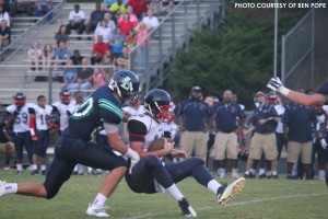 Daniel Gleiberman brings down the quarterback for his second of three sacks.