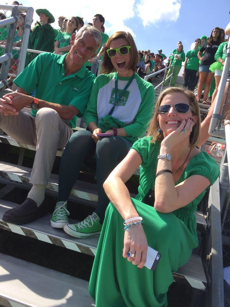Ms. Engdahl (far right) sits at a Leesville Road High School pep rally with Mr. Dinkenor and Mrs. Cade. Mr. Dinkenor was one of the first teachers Ms. Engdahl met when she first started at Leesville. (Photo courtesy of Michelle Engdahl.)