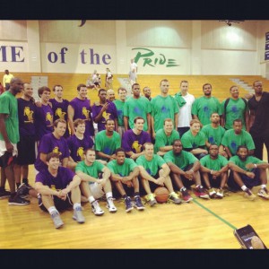 In 2012, former Leesville and Broughton players celebrate after playing in a reunion game to commemorate the game between Leesville and Broughton at Reynolds Coliseum. The game helped raise money for the Richard J. Murphy Scholarship fund, in honor of former Leesville principal Richard Murphy who passed away in 2011. (Photo used by permission of Shawan Robinson)