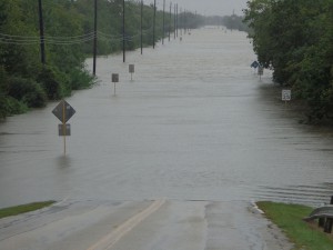 The extent of flooding on a local Houston street. Scenes like this were evident around the city, making it impossible to get necessities for days. (Photos used by permission of Kelly Thai) 