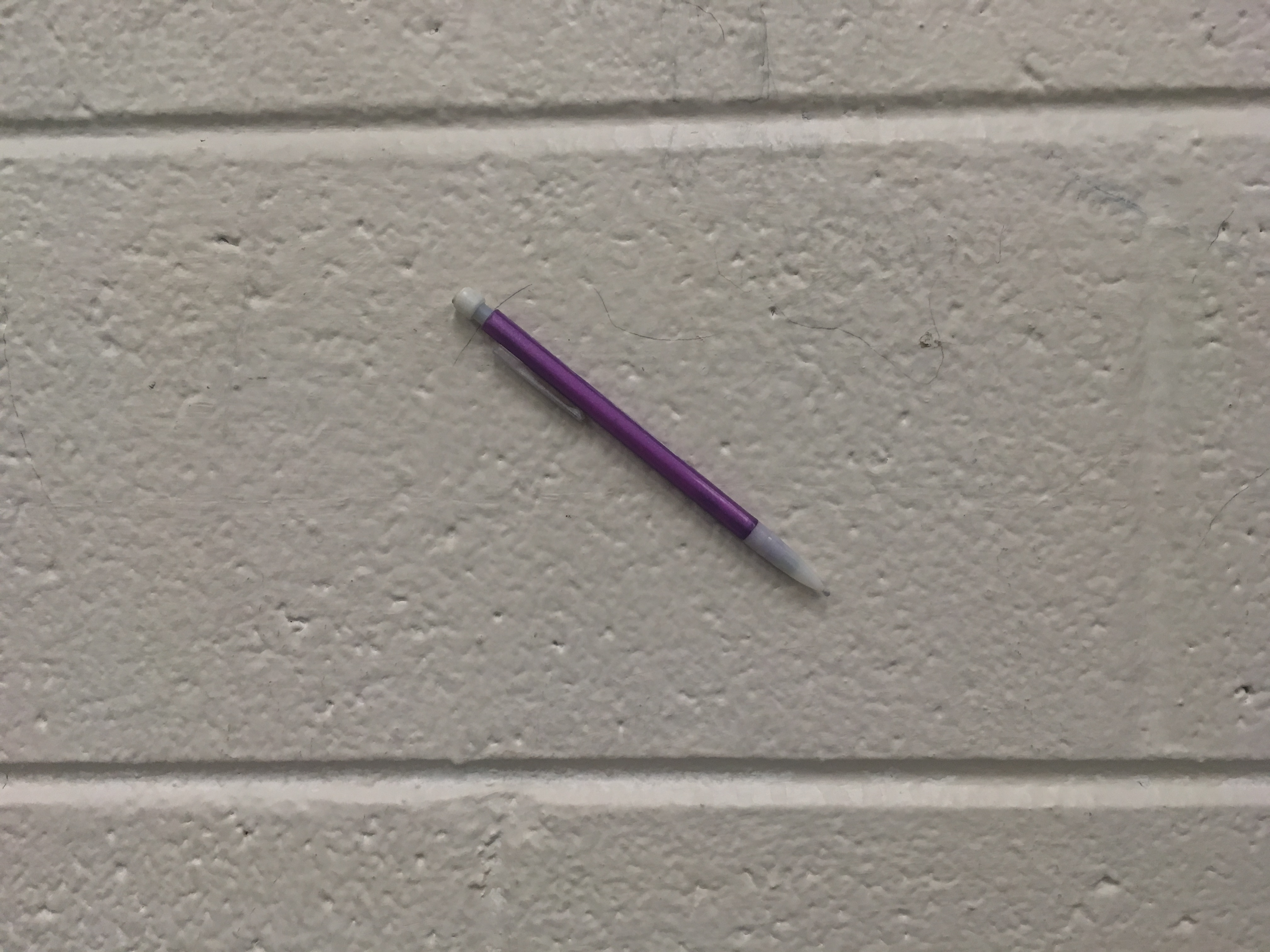 Sticking pictures to shop walls