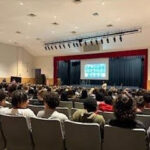 Leesville Road Highschool’s students attend Ms. Jacobs’ principal chat. The principal chat takes place in the auditorium. Principal chats help start the year with both the students and the staff being on the same page. (Photo courtesy of Natalia Fernandez)